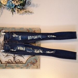 SWANK High Rise Ripped & Distressed Skinny Leg Jean.  Size 1